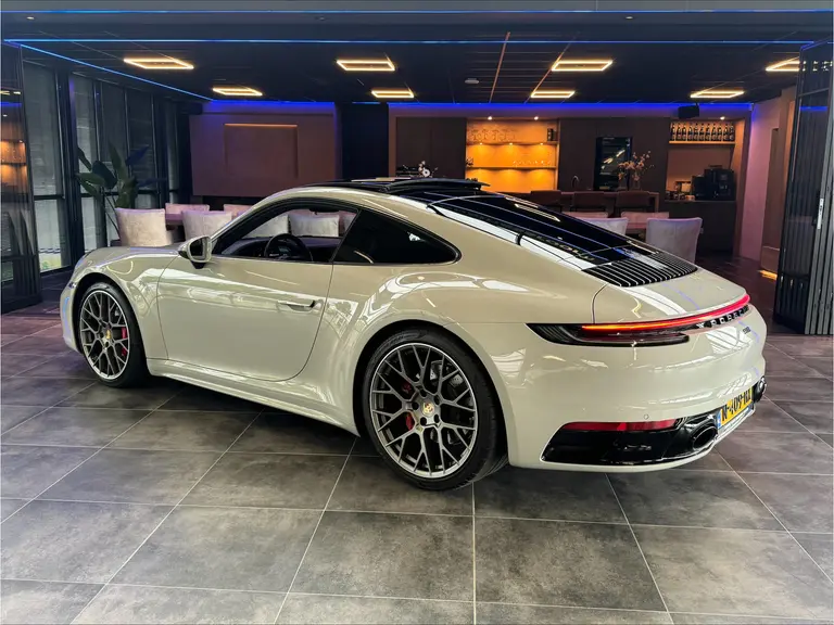 Porsche 911 3.0 Carrera 4S Sport chrono Bose Dealer onderhouden Kreide Grau Panoramadak ACC 450PK! afbeelding 14