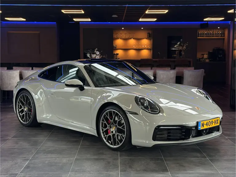 Porsche 911 3.0 Carrera 4S Sport chrono Bose Dealer onderhouden Kreide Grau Panoramadak ACC 450PK! afbeelding 1