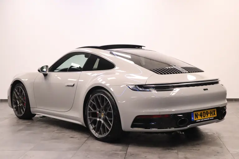 Porsche 911 3.0 Carrera 4S Sport chrono Bose Dealer onderhouden Kreide Grau Panoramadak ACC 450PK! afbeelding 4