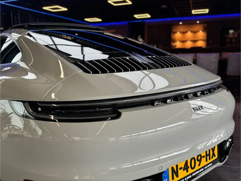 Porsche 911 3.0 Carrera 4S Sport chrono Bose Dealer onderhouden Kreide Grau Panoramadak ACC 450PK! afbeelding 15